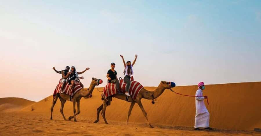 Desert Safari - Private 4WD car - The Camp Rhythm: Welcome Drinks, Henna, Camel Rides, and Costume Photos