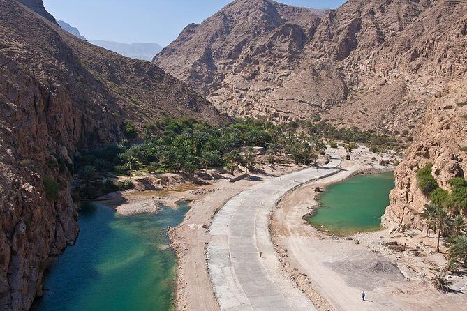 Discover the South and Wadi Shab from Muscat - Bimah Sinkhole: Half-Salted Water and a Stairway View
