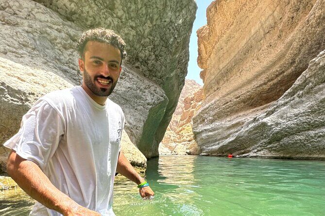 from muscat wadi shab and bimmah sinkhole tour - The Swimming Moment: When the Canyon Becomes a Playground