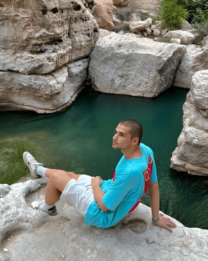 From Muscat: Wadi Shab & Bimmah Sinkhole Full-Day Tour - The waterfall swim inside the cave: where photos and patience both matter