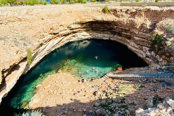 Full Day Group Tour to Wadi Shab Bimmah Sinkhole and Fins Beach - First Stop: Wadi Shab’s Canyon Pools and the Keyhole Cave