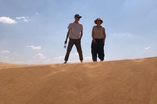 Full-Day Wahiba Desert and Wadi Bani Khalid Group Tour - Wahiba Sands by 4WD: Dune Bashing, Sand Sliding, and Camel Moments