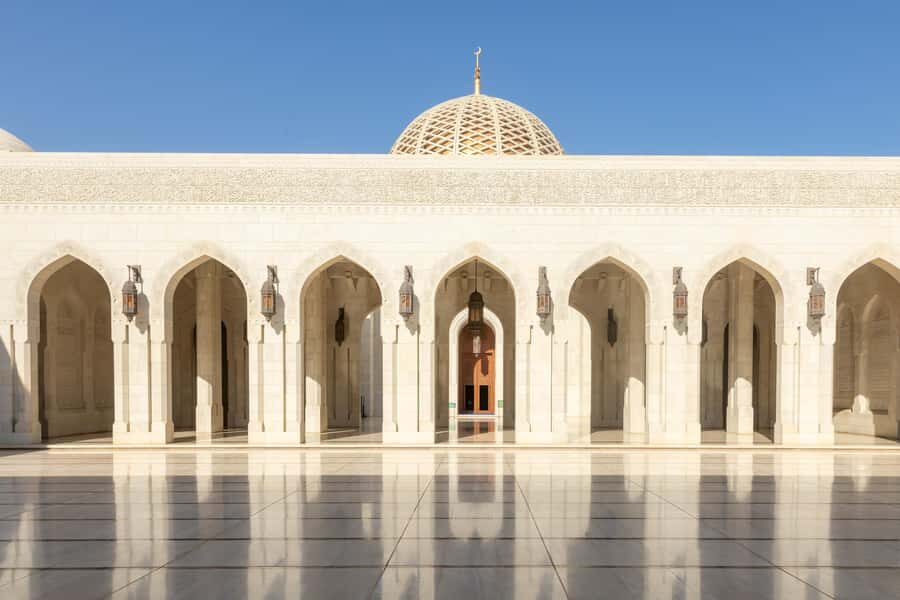 Guided Walking Tour of Sultan Qaboos Grand Mosque in Muscat - Gardens, courtyards, and marble color: your photo stops with purpose