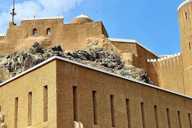 Half-Day Private Muscat City Tour - Top Landmarks in Just 4 Hours - Muttrah Souq and Al Alam Palace: Souvenirs, Stories, and Royal Edges