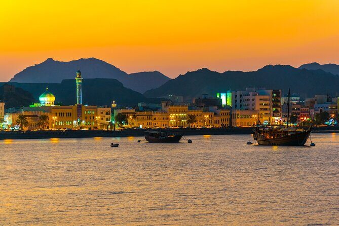 Historical Muscat Sunset Tour - Onboard vibe: traditional dhow charm, refreshments, and dolphin chances
