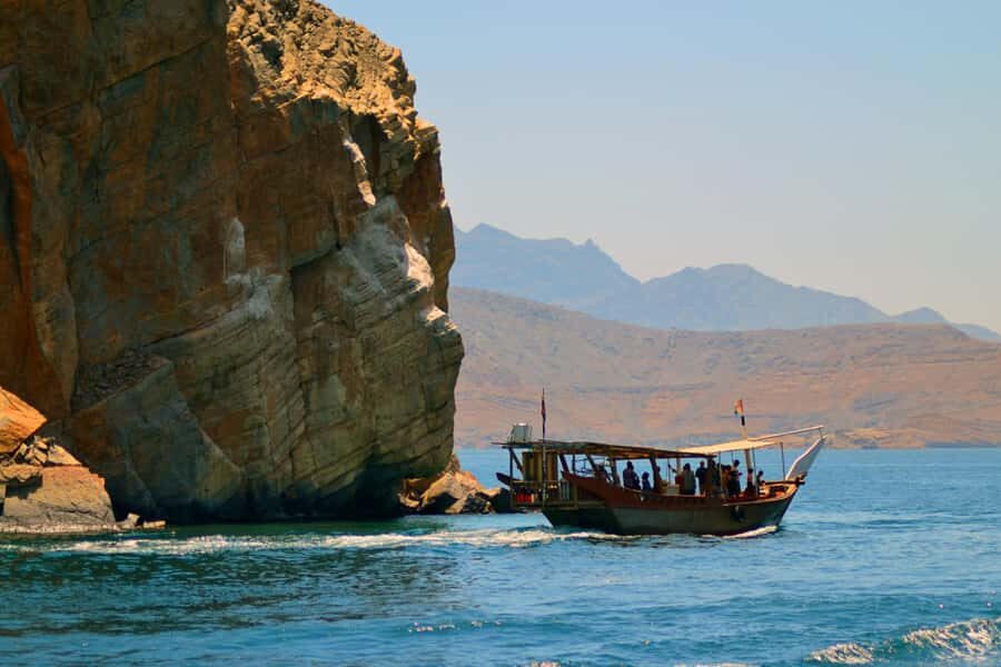 Khasab: Dolphin Watching Day Tour with Snorkeling & Lunch - Telegraph Island stop around 11:45: first swims, photos, and coffee time