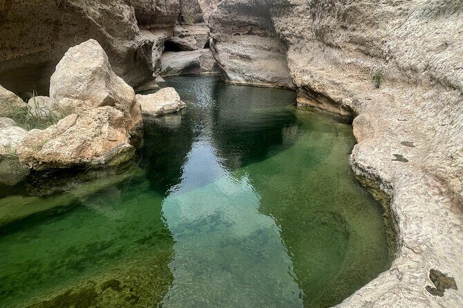 Private Day Trip to Wadi Shab, Fins Beach & Bimmah Sinkhole - Bimmah Sinkhole: a Limestone Lake You Can Swim In