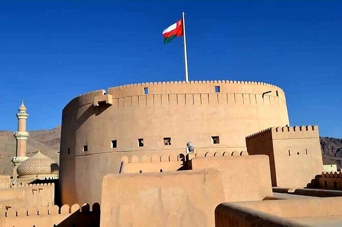 Private Full Day Historical Trip in Oman - Stop 3: Nizwa Fort museum, towers, and defensive architecture
