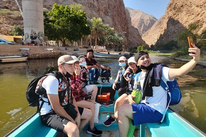 Private Full-Day Wadi Shab and Bimmah Sinkhole Tour - Bimmah Sinkhole: A Sea-Adjacent Crater With a Small Lake at the Bottom