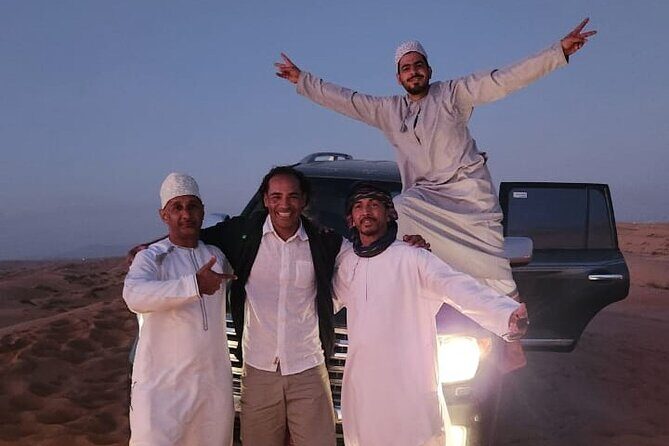 Private Sunset Watching Desert Safari with Dinner - Wahiba Sands dunes and the photo-ready sunset from the top