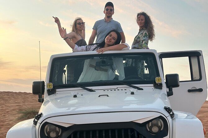 Sunset in Wahiba Sands 4x4 Adventure - Desert camp dinner: Omani food after the adrenaline